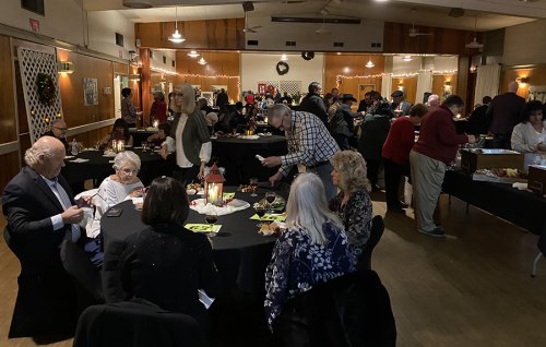 A crowd of about 125 people attended a fundraiser for the Carnegie Museum and raised more than $20,000 at the Hanford Fraternal Hall.